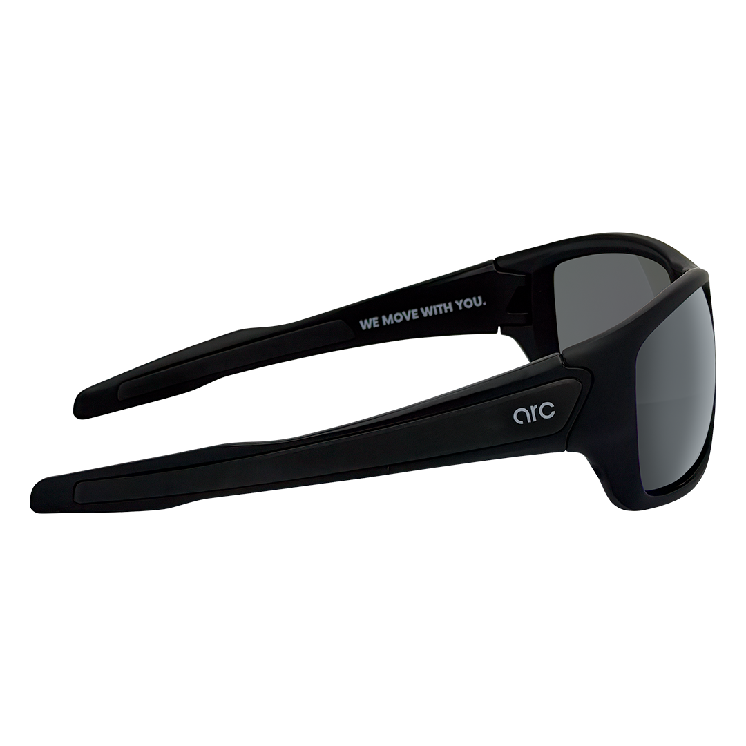 ARC Fade matte black polarised sports sunglasses with smoke lenses and wraparound frame seen from the right